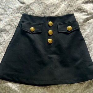 Balmain black skort with gold buttons